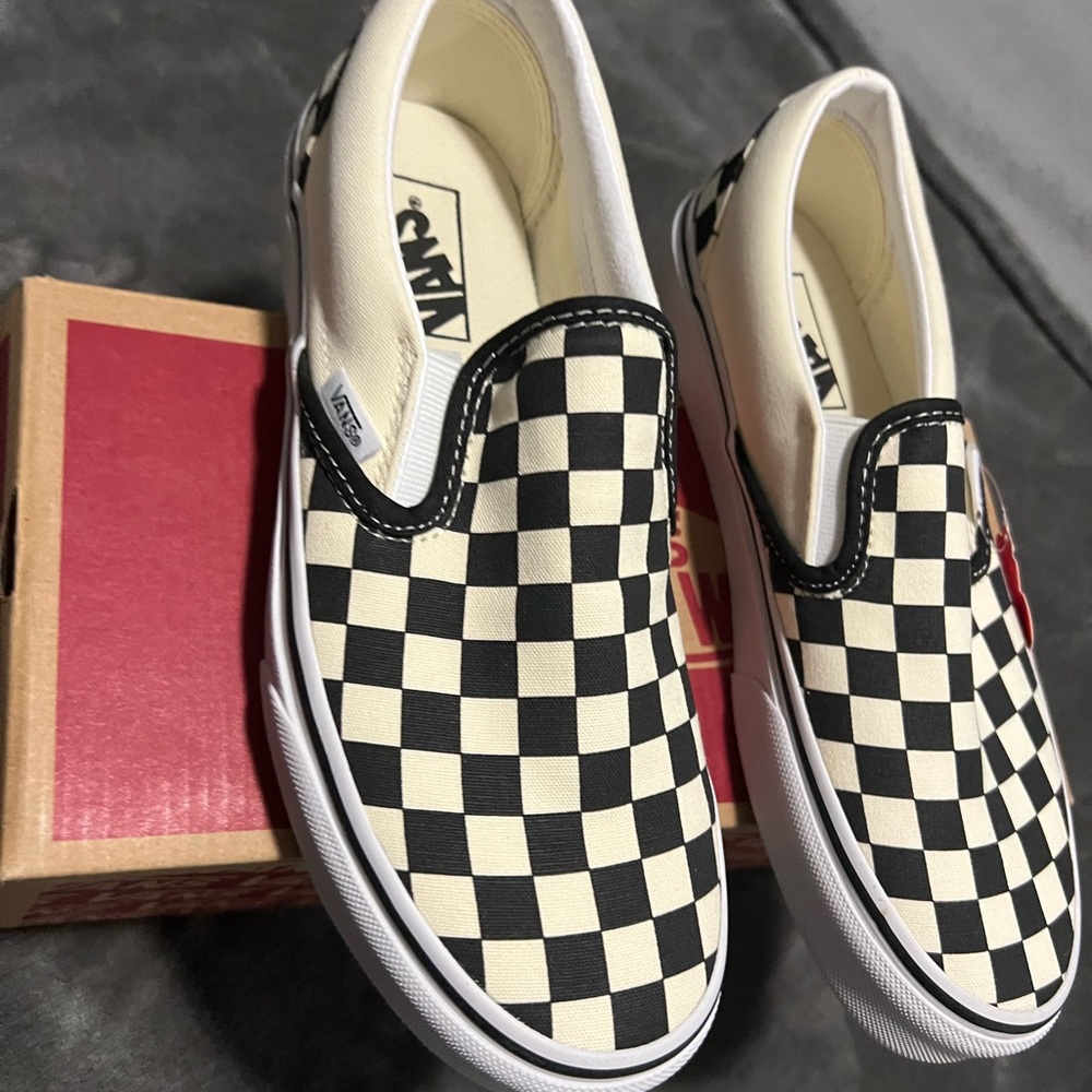 Vans Black and Cream Checkerboard Slip-Ons